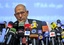 Head of the International Atomic Energy Agency, Mohamed ElBaradei, attends a joint press conference with the head of Iran's Atomic Energy Organization, Ali Akbar Salehi, unseen, in Tehran, Iran, Sunday, Oct. 4, 2009.