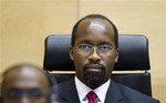 Rwandan Callixte Mbarushimana is seen during his initial appearance at the International Criminal Court in The Hague, Netherlands, Friday, Jan. 28, 2011. Mbarushimana, a 47-year-old leader of the Hutu rebel group Democratic Forces for the Liberation of Rwanda, or FDLR, was arrested in Paris in October and extradited by France and incarcerated at the court's prison complex on Tuesday Jan. 25. He is charged with 11 counts of crimes against humanity and war crimes, including murder, rape, persecution based on gender, and extensive destruction of property by the FDLR in 2009.