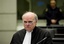 Prosecutor Daniel Bellemare of Canada looks up in the court room of the Hariri tribunal in Leidschendam, Netherlands, Monday Feb. 7, 2011. Lawyers and judges at a U.N.-backed tribunal  are trying to thrash out the question of what constitutes an act of terrorism, and other legal issues, as they prepare to prosecute suspects for the assassination of former Lebanese Prime Minister Rafik Hariri. A hearing at the Special Tribunal for Lebanon  (STL) is aimed at clarifying laws the court will apply to those allegedly responsible for the truck bomb that killed Hariri and 22 others in Beirut on Feb. 14, 2005.