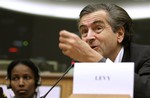 Former Dutch lawmaker Ayaan Hirsi Ali, left, and French philiosopher Bernard-Henri Levy address the European Parliament in Brussels, Thursday, Feb. 14, 2008.