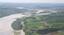 Aerial view of the Town of Peace River from the northside. Misery Mountain is visible at the center while Bewley Island is to the right