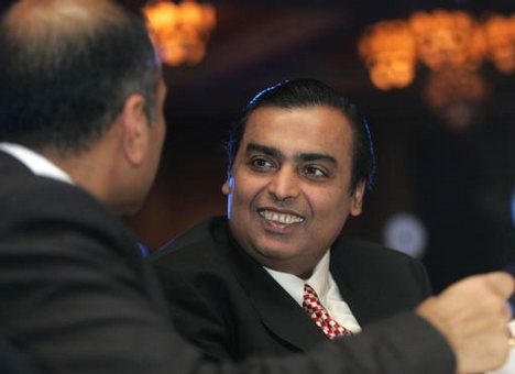 Chairman of Reliance Industries Ltd. Mukesh Ambani interacts with Chairman Bharti Airtel Ltd. Sunil