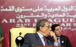 Amr Moussa, secretary general of the Arab League, looks on during the Arab summit in Doha, Qatar, Monday, March 30, 2009. The main topics to be addressed at the summit include ongoing Palestinian feuding and crafting an Arab response to the Hague-based International Criminal Court's arrest warrant for Sudanese President Omar al-Bashir for crimes against humanity in the suppression of a rebellion in the Darfur re