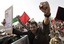 Friends and relatives chant anti-government slogans during the funeral of Mahmoud Maki Abu Taki, 22, who died during clashes between Bahraini anti-government protesters and riot police on early Thursday, in Sitra village, Bahrain, Friday, Feb. 18, 2011.