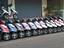 Automobile industry - Scooty pep, modern 4 stroke 75cc scooters parked outside the showroom, Pune, India.