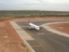 Indian Airlines aircraft waiting for takeoff at Bengaluru International Airport.