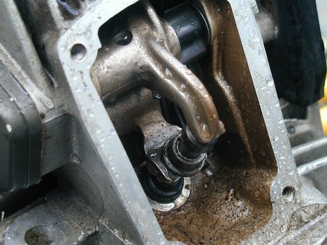 Desmodromic poppet valve in Ducat engine. A desmodromic valve is a reciprocating engine valve that is positively closed by a cam and leverage system, rather than by a more conventional spring.