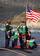 Crew members of Los Angeles-class attack submarine USS San Juan (SSN 751) work to complete mooring operations after the submarine arrived for a port visit.