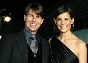  Tom Cruise, left, and Katie Holmes arrive at the premiere of the movie &quot;Lions for Lambs&quot;  