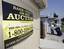 A sign on a foreclosed home is shown in Antioch, Calif., Thursday, Aug. 14, 2008.