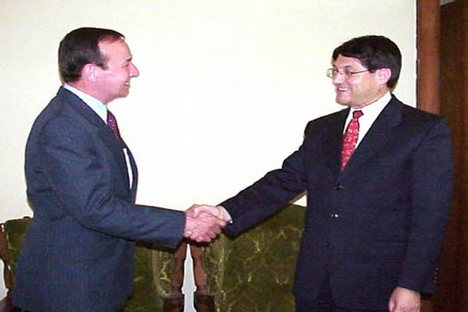 USAID Mission Director Craig Buck and Dr. Anwar-ul-Haq Ahady in 2002