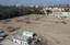 A high up, look down view of the United States Agency for International Development (USAID) headquarters compound currently under construction by Iraqi contractors in Baghdad, Iraq (IRQ), during Operation IRAQI FREEDOM. %lt;table