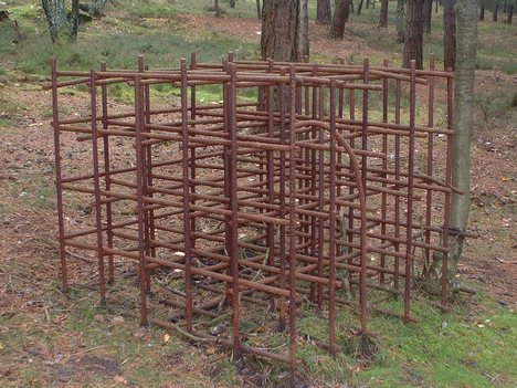 An image of a reconstruction of the Atlantic Wall defenses at Hankley Common in the UK in 1943 for the purpose of training prior to D-day.