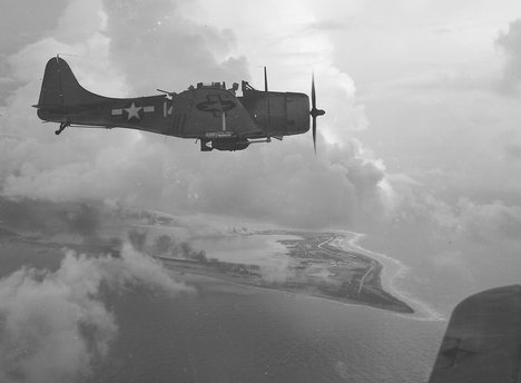 A VB-5 SBD from USS Yorktown (CV-10) over Wake, early October 1943.