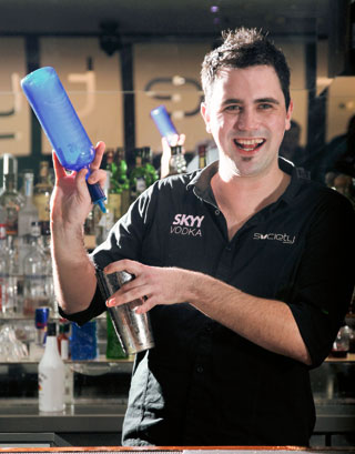 <strong> Flair for success: </strong> Bartender Dan Kelly in action at Society.