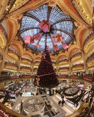 Galeries Lafayette's famous dome and suspended Christmas tree, in Paris.