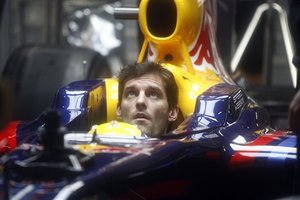 Red Bull's driver Mark Webber, of Australia, looks on at the pit during the third training session ahead Sunday's Brazilian F1 Grand Prix, at the Interlagos racetrack in Sao Paulo, Saturday, Oct. 17, 2009.