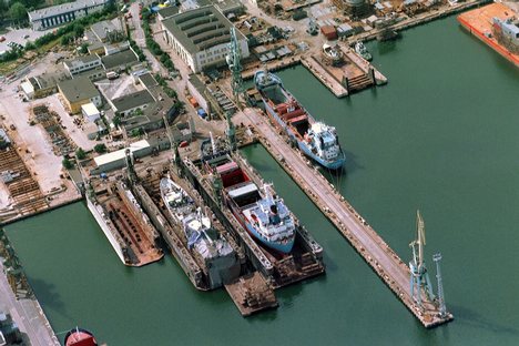 Floating docks, Gdynia, Poland. A floating dry dock is a type of pontoon for dry docking ships, possessing flood able buoyancy chambers and a 