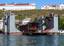 Floating dry dock located in Sevastopol. A floating dry dock is a type of pontoon for dry docking ships, possessing flood able buoyancy chambers and a 