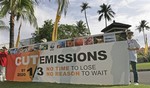  World Wildlife Fund (WWF) activists display banner outside the venue of U.N. Climate Change Conferen 