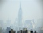 This July 10 2007 file photo shows smog covering midtown Manhattan in New York. The EPA on Friday, April 17, 2009, declared that carbon dioxide and five other greenhouse gases sent off by cars and many industrial plants "endanger public health and welfare," setting the stage for regulating them under federal clean air laws