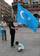 A Uyghur man protests in Munich