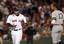 Boston Red Sox's Manny Ramirez, left, speaks to New York Yankees' Alex Rodriguez as Ramirez runs to the dugout in the first inning of a baseball game at Fenway Park in Boston on Sunday, July 27, 2008.