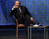 Italian Premier Silvio Berlusconi pretends to talk on the phone as he gestures during the youths People of Freedom party meeting in Rome, Wednesday, Sept. 9, 2009. Thirty women. Eighteen parties. Guests willing to supply sex "if the need arises.'' Two Italian newspapers published what they described Wednesday as excerpts from prosecutors' interrogation of a businessman who said he paid dozens of women to attend parties at Premier Silvio Berlusconi's Sardinia villa and his Rome residence. Nevertheless, Berlusconi has continued to insist Italians want him this way, saying Wednesday at a gathering of young party faithful that he loves everyone, including "beautiful women,'' and joking that the women in the audience who wanted to ask questions should leave their phone numbers with organizers.