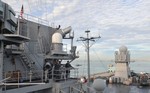 US Navy 110312-N-0864H-286 Sailors aboard the U.S. 7th Fleet command ship USS Blue Ridge (LCC 19) hoist the ensign during morning colors as the shi