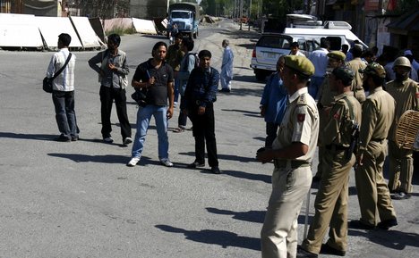 Media persons being stopped by police personal as they were heading towards office of chairman hurriyat conference Syed Ali Shah Geelani to attend a press conference at hyderpora srinagar on 03 June 2009. Geelani was arrested before adressing an importan t press conference from his residence in srinagar.