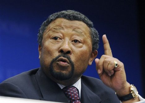 African Union Chairman Jean Ping gestures while talking to the media during a press conference at the European Union Council building following the Somalia Donors Conference held in Brussels, Thursday April 23 , 2009.