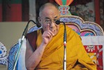 The leader of Tibet His Holiness the Dalai Lama giving a teaching to the thousands of Buddhist followers in the Himalayan region of Manali, India