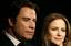 Actor John Travolta and his actress-wife Kelly Presont arrive at the Santa Barbara International Film Festival's Kirk Douglas Award for Excellence in Film presented to Travolta, Thursday, Nov. 15, 2007 in Santa Barbara, C