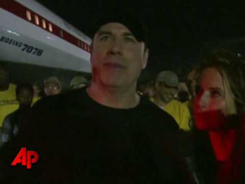 Raw Video: John Travolta Flies Relief Into Haiti