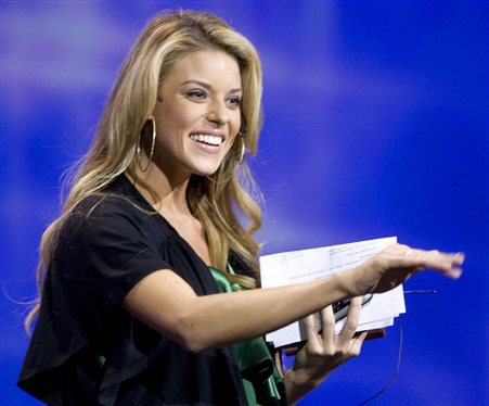 n this April 26, 2009 file photo, Miss California, Carrie Prejean, waves as she comes on stage at the Rock Church during services in San Diego. PreJean said she'll be working with the National Organization for Marriage to 