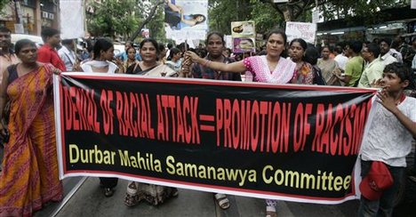 Indian sex workers and members of Durbar Mahila Samanawya Committee, a non-government organization for sex workers from West Bengal, participate in a protest rally against the alleged racial attacks on Indian students in Australia, in Calcutta, India, Tuesday, June 9, 2009.