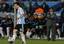 Argentina head coach Diego Maradona, right, looks at Argentina's Lionel Messi