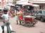 An itinerant salesman of drinks Un vendeur ambulant des boissons.Togo and Africa