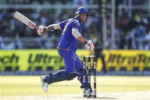 Rajasthan Royals Shane Warne misses a shot while batting against Kolkata Knight Riders during their 2009 Indian Premier League