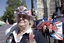 A royal enthusiast camps across the road from the Westminster Abbey in order to ensure the best viewing spot, for the upcoming royal wedding, in central London, Wednesday, April 27, 2011. Britain's Prince William and Kate Middleton will get married at the Abbey on Friday, April 29, 2011.