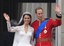 Kate and William offer a wave from the balcony to the masses gathered at Buckingham Palace. Not visible: a handful of revelers who decided to splash around in a nearby fountain.