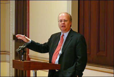 File - Karl Rove delivers remarks to the Summer 2004 White House Interns in the Dwight D. Eisenhower Executive Office Building, Aug. 3, 2004.