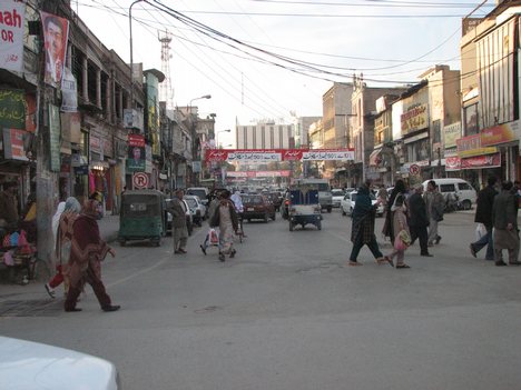 Pakistan, Street Scene in Peshawar. Situated on the Afghan border, Peshawar, capital of North West Frontier province, today it is a partly modern and partly ancient city.