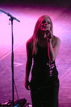 Lavigne performing during The Best Damn Tour at the Beijing Wukesong Arena in 2008