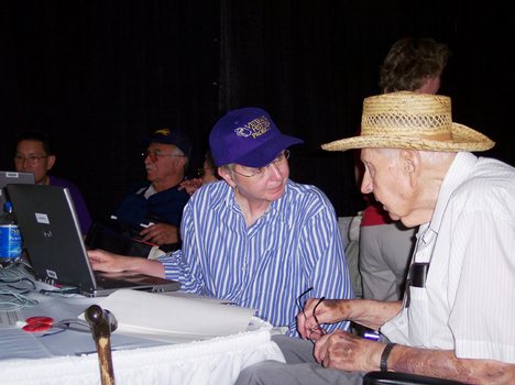 Army veteran John Shoffner shares his World War II experiences with Library of Congress Veterans History Project worker Marilyn Parr. The history project targeted the World War II Reunion in Washington D.C. May 28-31 for special collection efforts to ensu