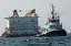 The chartered barge Ocean 6 being towed by tug boat Dona II in the Persian Gulf.