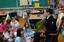 Cryptologic Technician (Interpretive) 2nd Class Ashlee Russo and her plush cow reads a book by Dr. Seuss to students at George C. Marshall Elementary School.