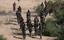 Militants with the Democratic Front for the Liberation of Palestine (DFLP) take part in a military training session, May 19, 2011, in the southern Gaza Strip town of Khan Yunis.(Photo By ahmed Deeb/wn)