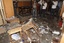 Pakistani media visit an illegal gambling den after a bomb blast in Karachi, Pakistan killed15 people and wounded many more on Thursday, April 21, 2011, officials said.