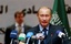  Russian President Vladimir Putin addresses Saudi businessmen Monday, Feb. 12, 2007, at the Council of Saudi Chambers of Commerce and Industry in Riyadh, Saudi Arabia. Putin on Monday met with Saudi and Russian businessmen seeking to explore investment op